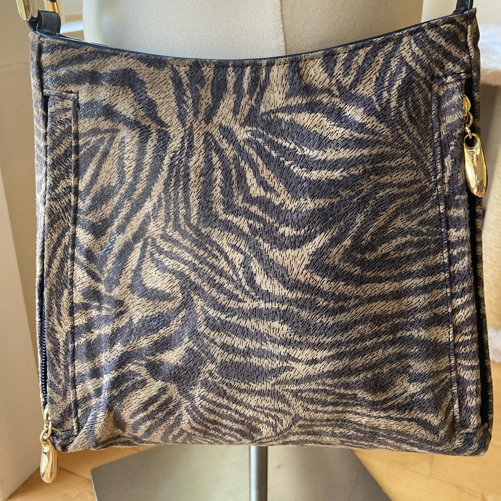 Genuine leather zebra print crossbody bag.